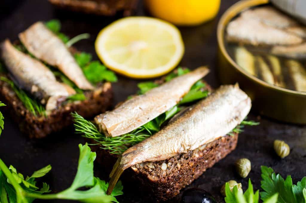 sardines on rye bread with herbs