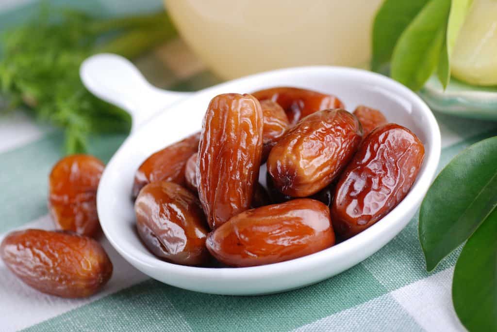 dates in a white bowl