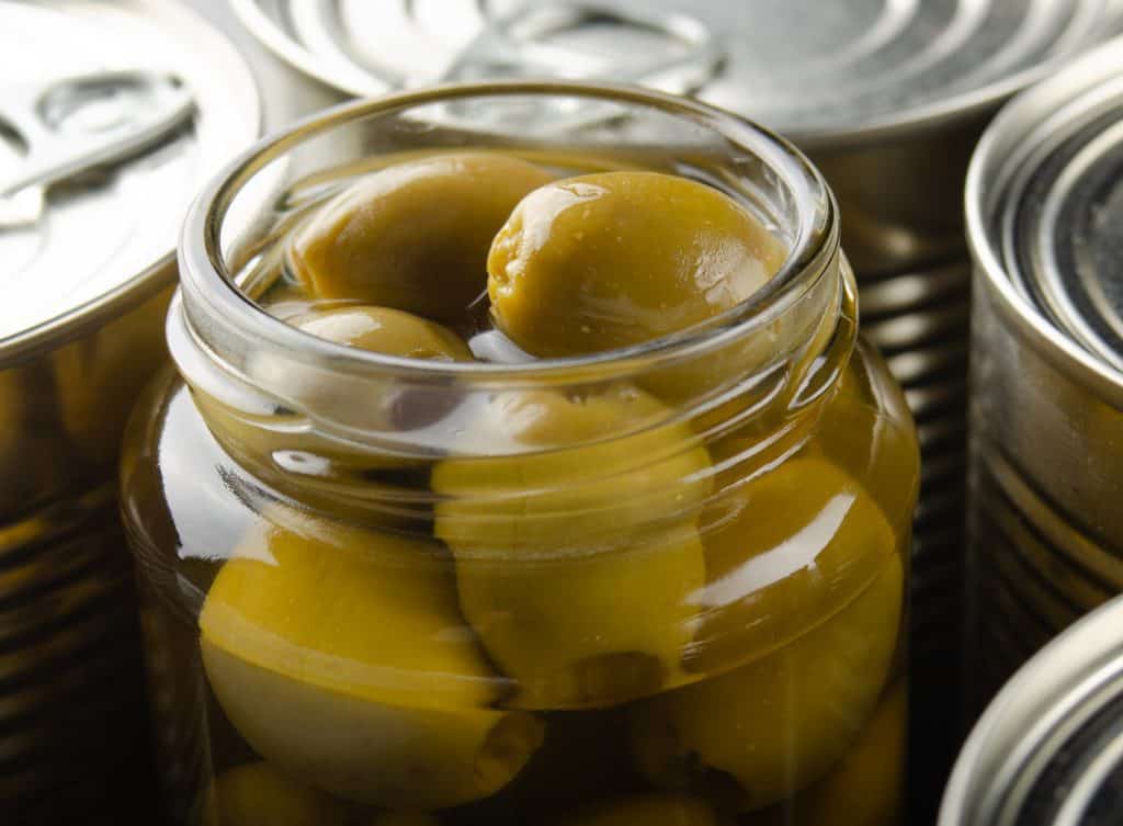 canned green olives in a jar