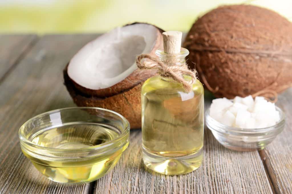 coconut oil in a bowl and in a bottle