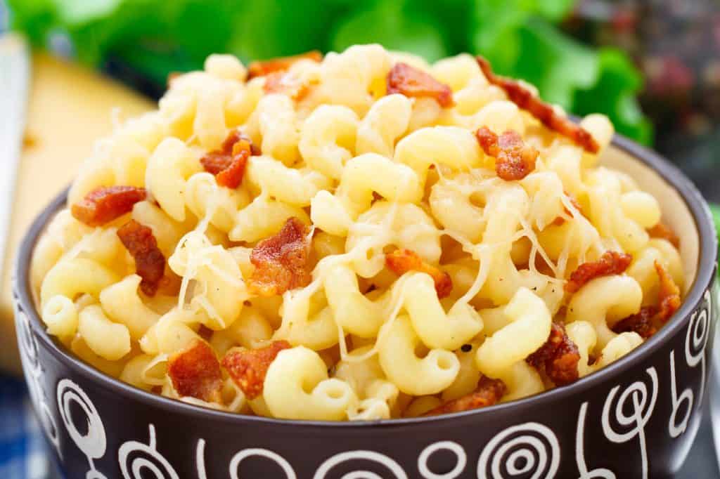 Delicious mac and cheese with bacon in a bowl