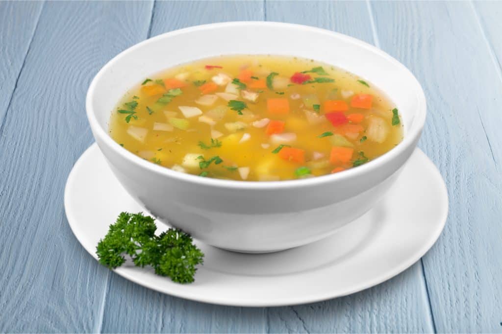 vegetable soup in a white bowl